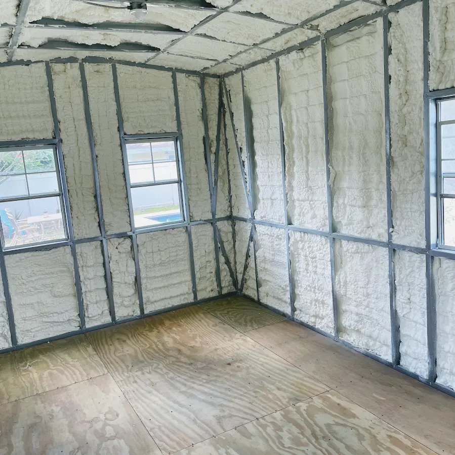 Closed-cell spray foam insulation applied to wall cavities in a residential project in Broomfield